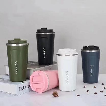 Set of colorful coffee tumblers with 'coffee' text on a neutral background