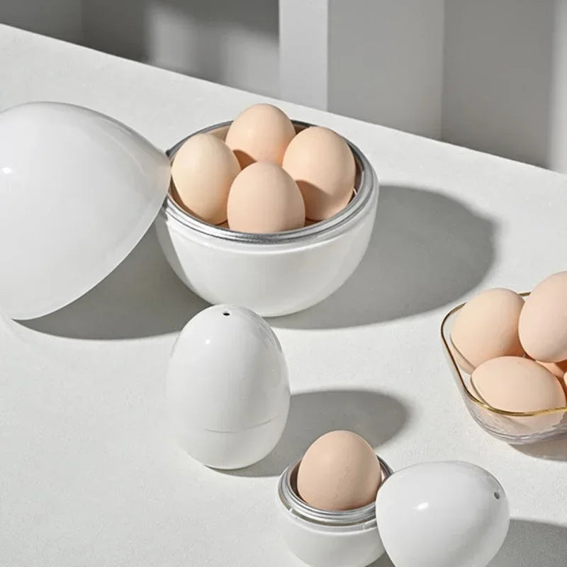 Eggs in white ceramic containers on a light surface