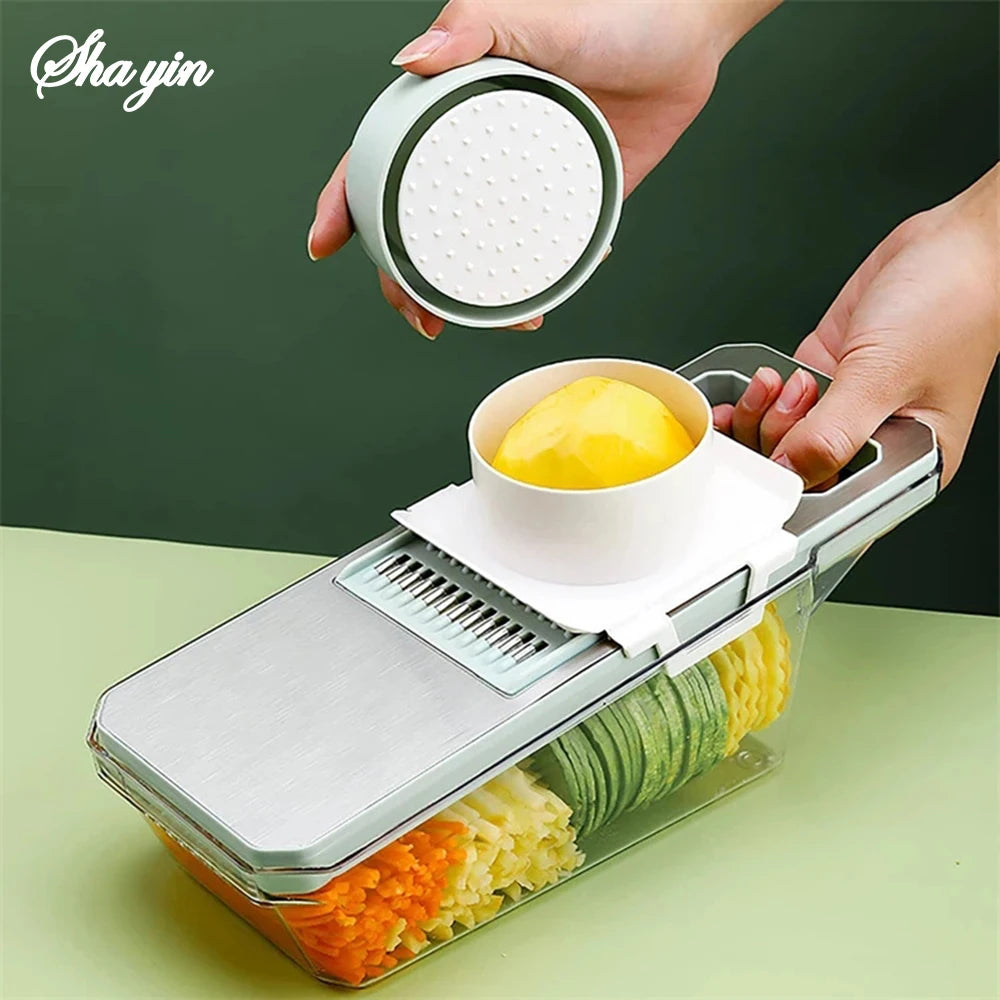 Shayin vegetable chopper with various vegetables being chopped on a green background