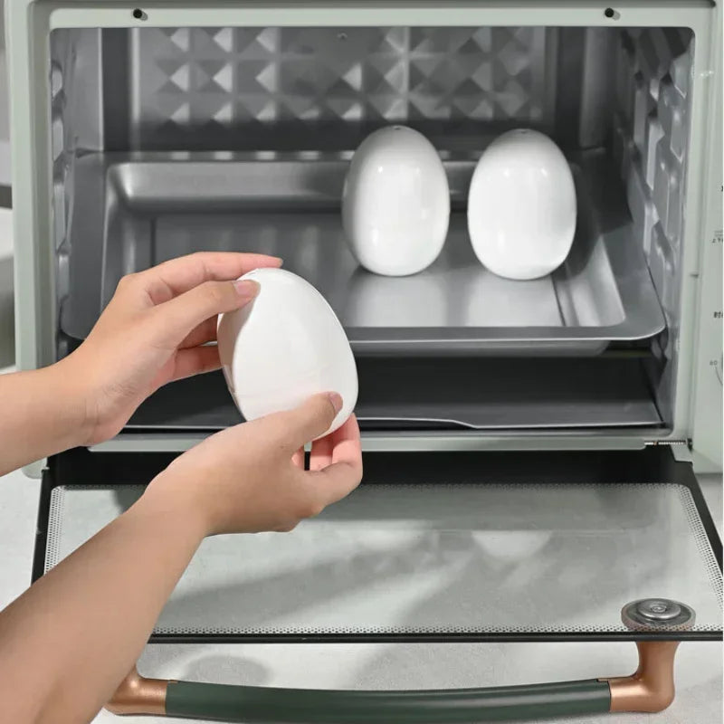 Person placing eggs into a portable oven.