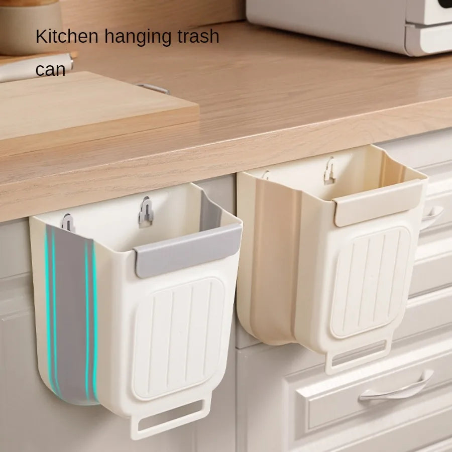 Kitchen hanging trash can attached to a cabinet door with text 'Kitchen hanging trash can'.