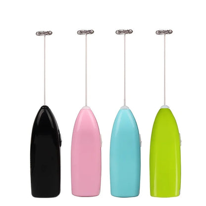 Four colorful milk frothers on a white background